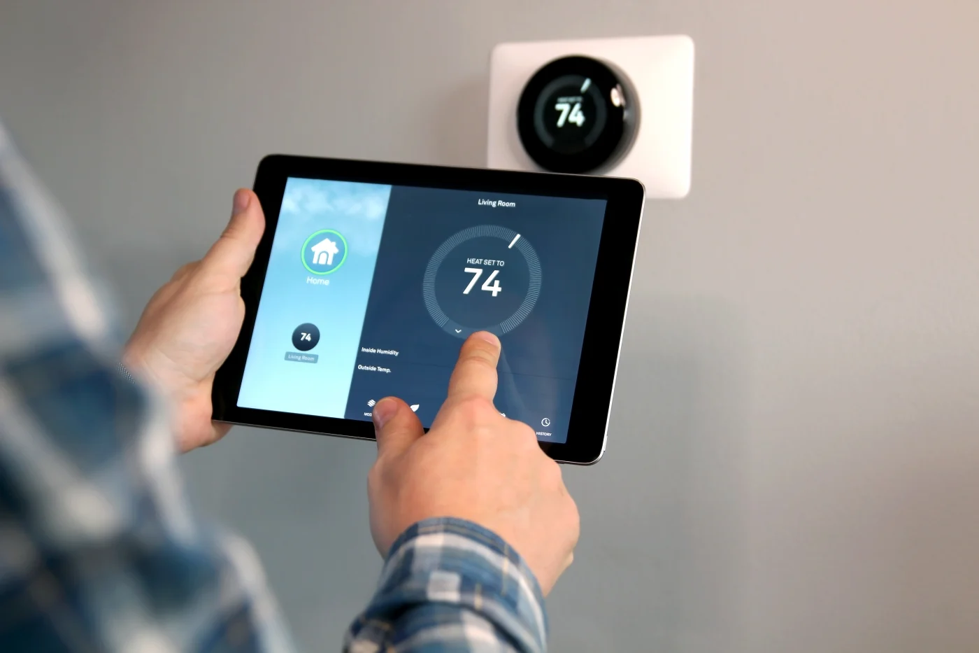 A Priority Heating & Cooling customer operates their AC on ipad