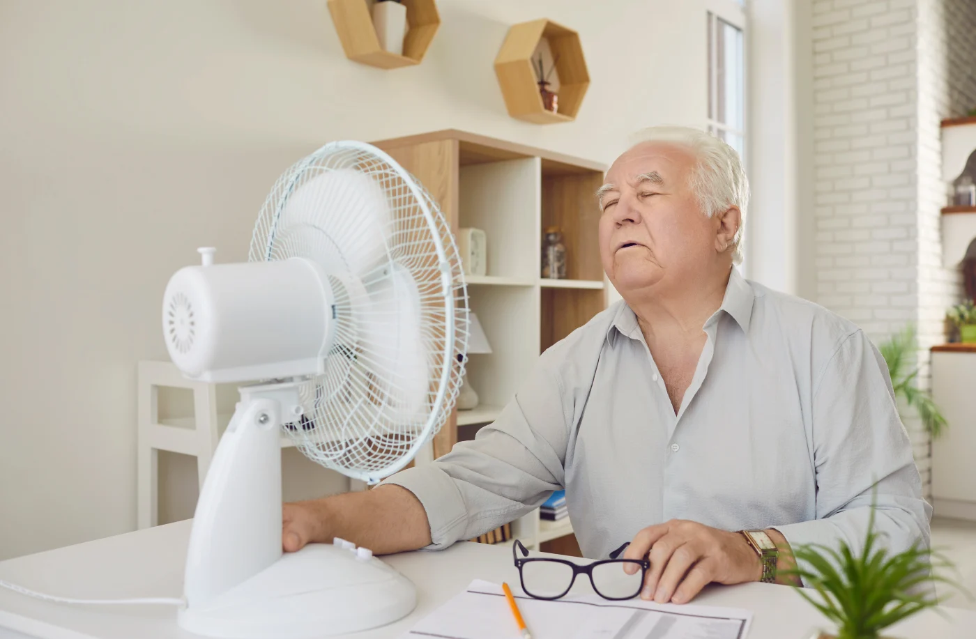 Twin Cities East Metro homeowner sits hot in front of blowing fan