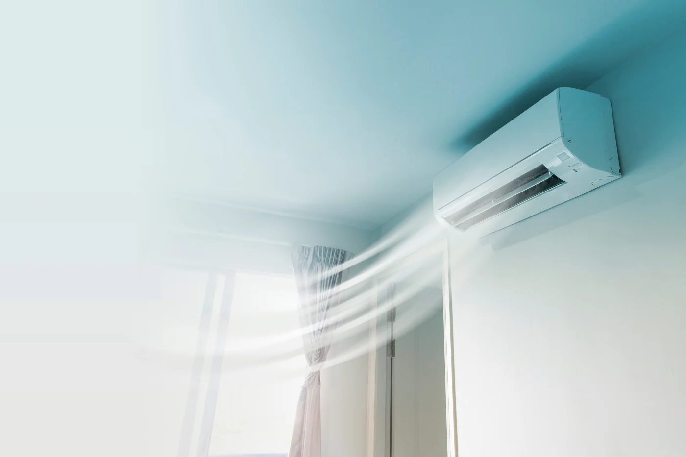 Air conditioner on the wall of a house