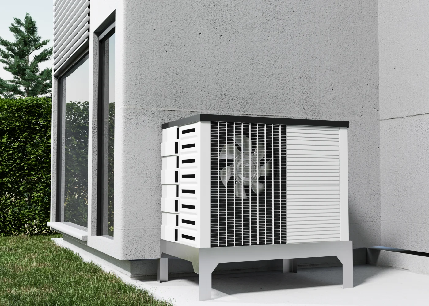A newer black and white HVAC system is outside near a grey house.