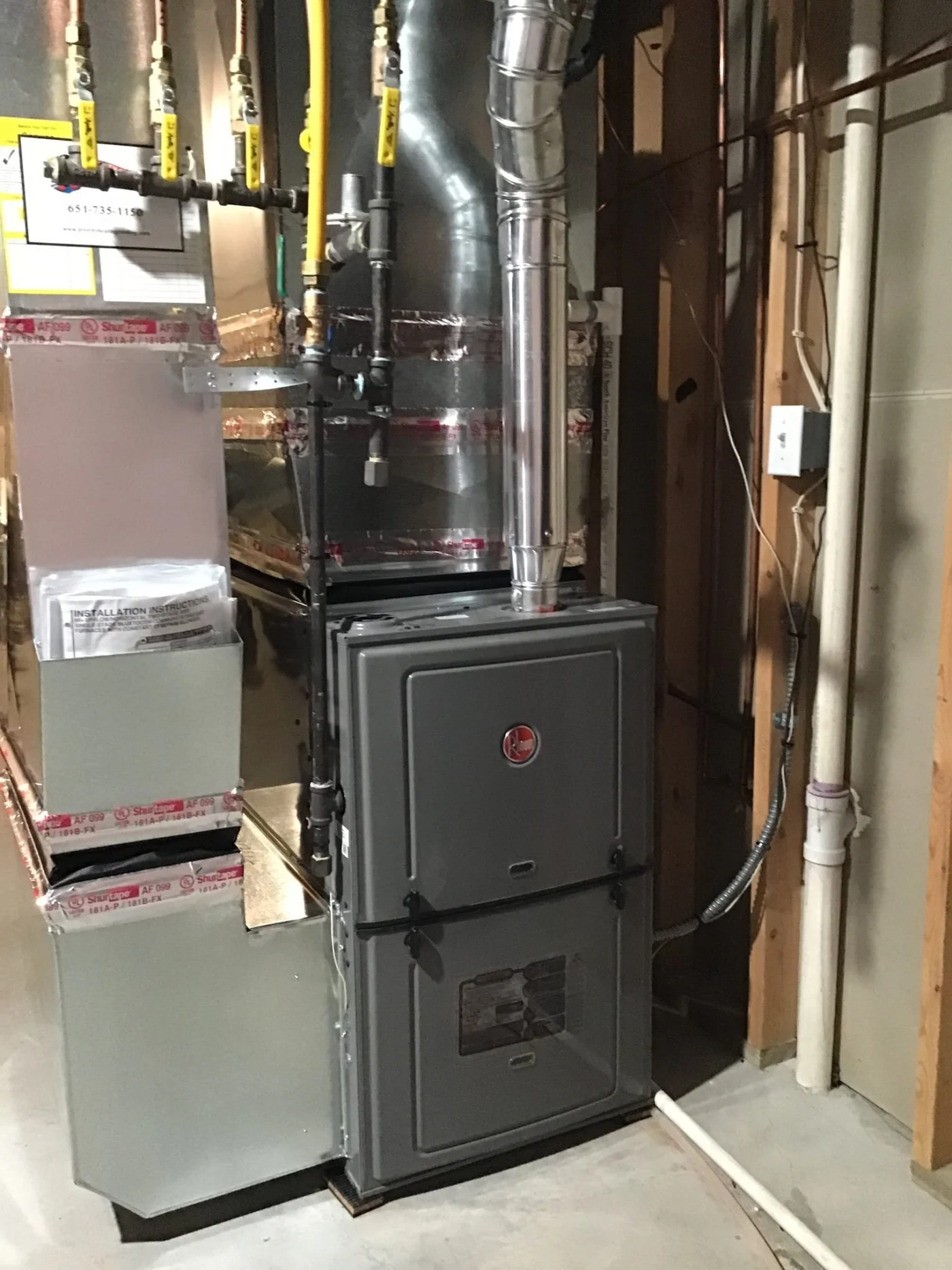 Spectacular Furnace Replacement | Inver Grove Heights, MN High-efficiency Rheem furnace replacement installed in a basement by Priority Heating and Cooling.