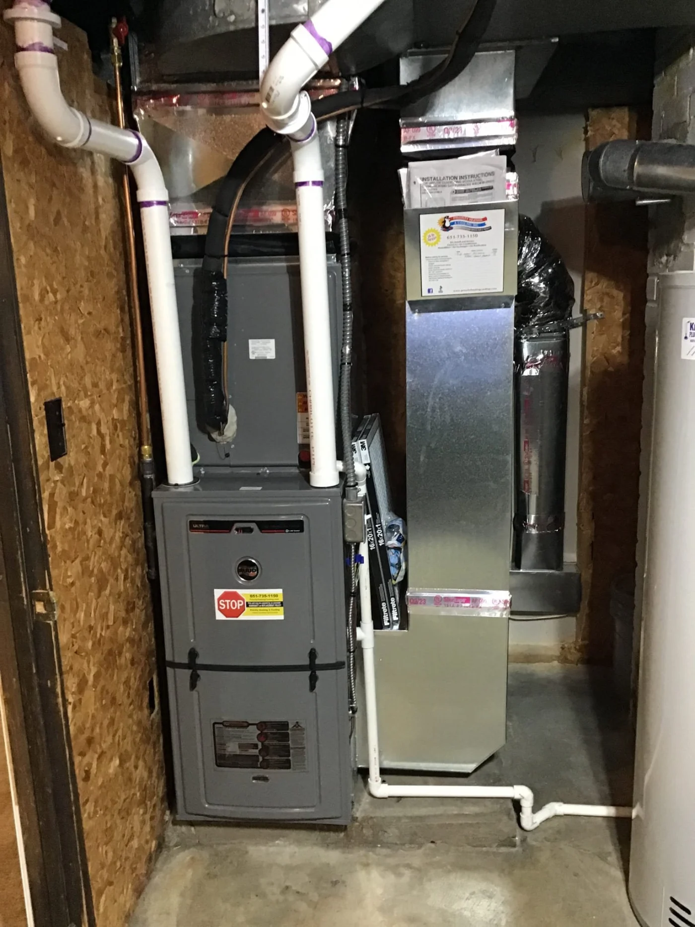 Dependable furnace replacement in Maplewood, MN, featuring a high-efficiency gas furnace with PVC venting, sealed metal ductwork, and a neat basement.